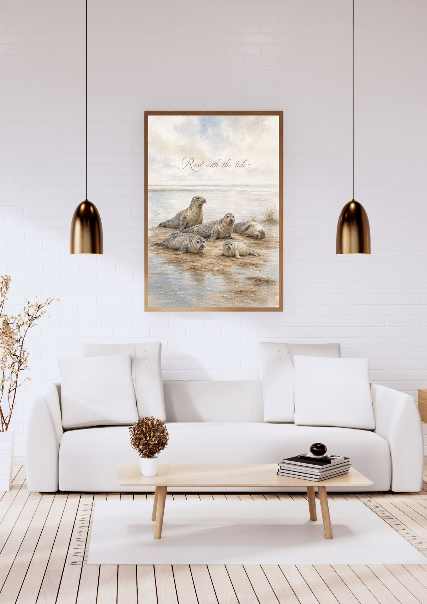 Framed watercolor seal poster with “Rest with the Tide” displayed in a bright coastal interior