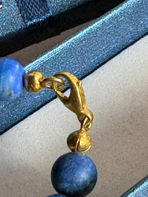Blue lapis lazuli beads and lobster clasp made of 8 karat gold